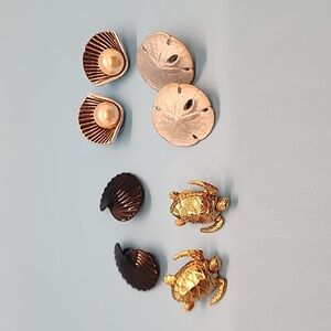 Four pairs of vintage sea themed clip on earrings